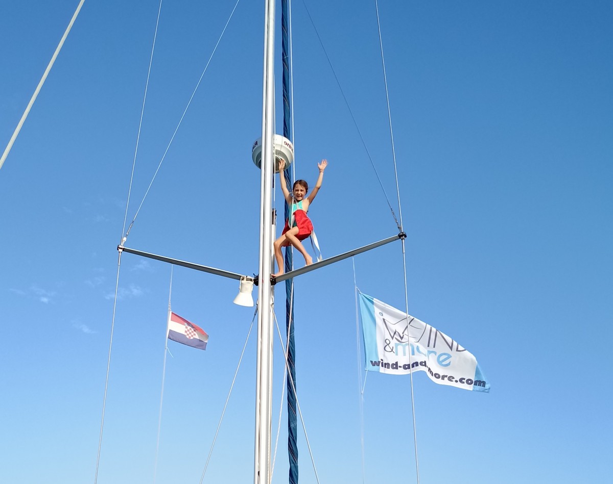 Family sailing from Istria to the Kvarner Gulf by Peter Borzucki