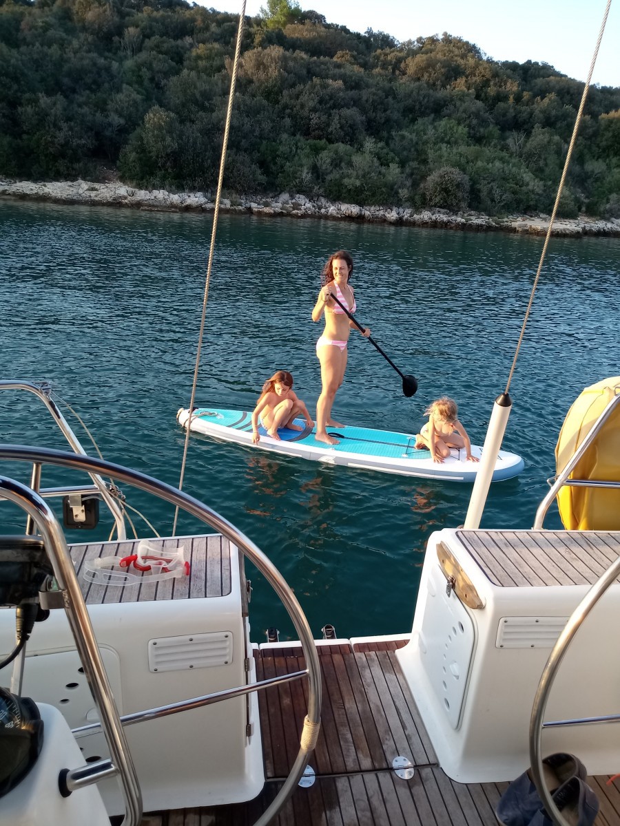 Family sailing from Istria to the Kvarner Gulf by