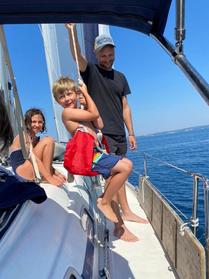 Family sailing from Istria to the Kvarner Gulf by