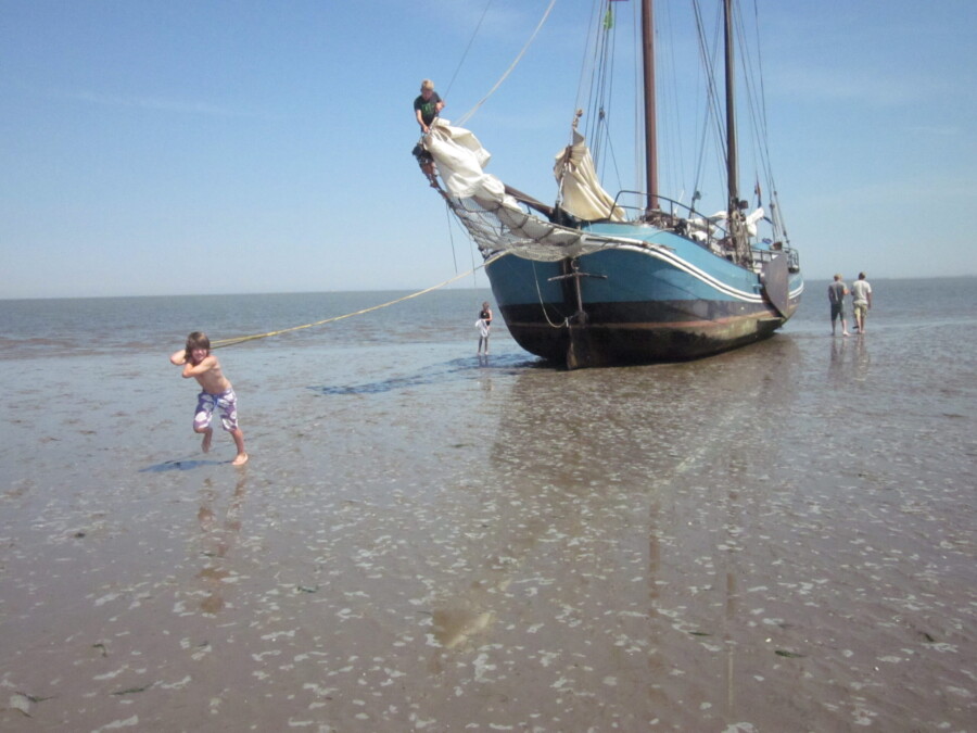 Family sailing on the IJsselmeer by