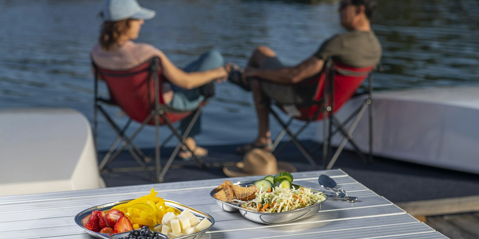 Crew having a meal on the deck of a sailing yacht Crew having a meal on the deck of a sailing yacht