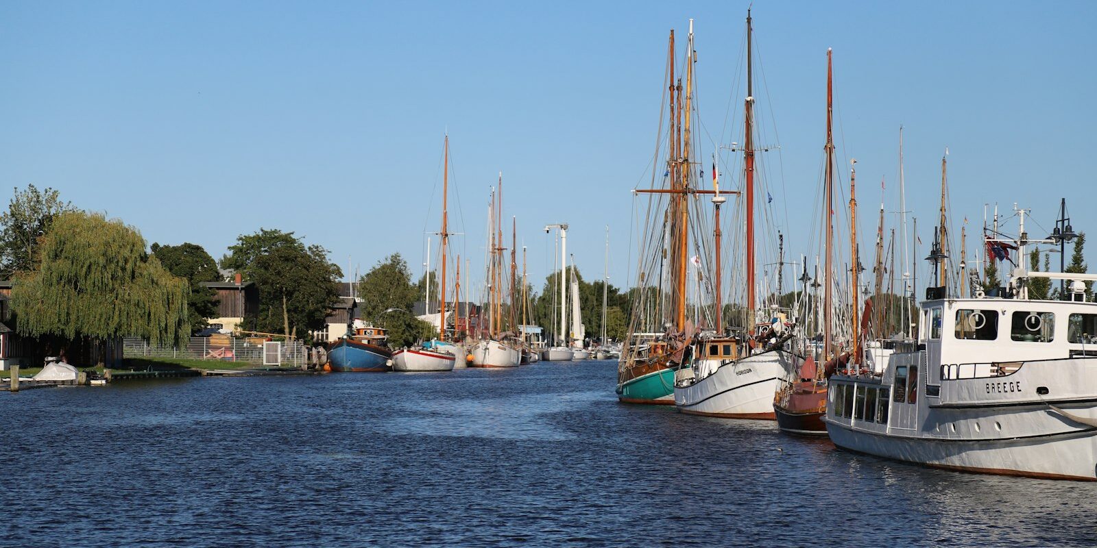 Traditional ships and sailing boats on the Ryck in Greifswald Traditional ships and sailing boats on the Ryck in Greifswald